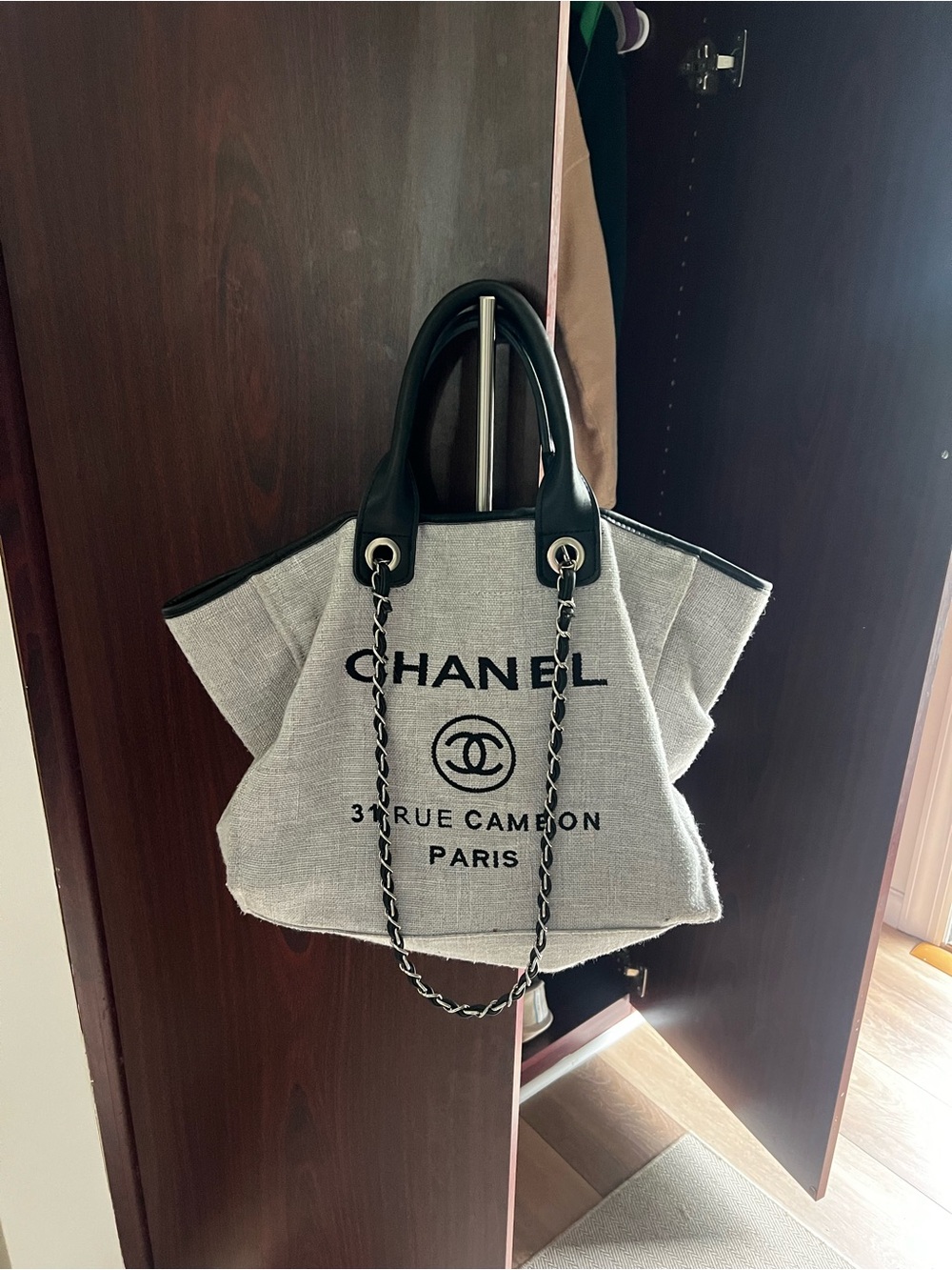 Chanel Beige Canvas Tote with Black Trim and Chain Handles